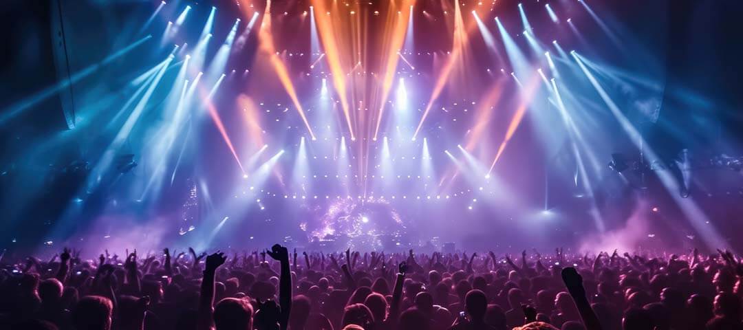 Branding and brand building by leading internet marketing agency Vibrant concert crowd under colorful lights, symbolizing branding and engagement through powerful content strategies.