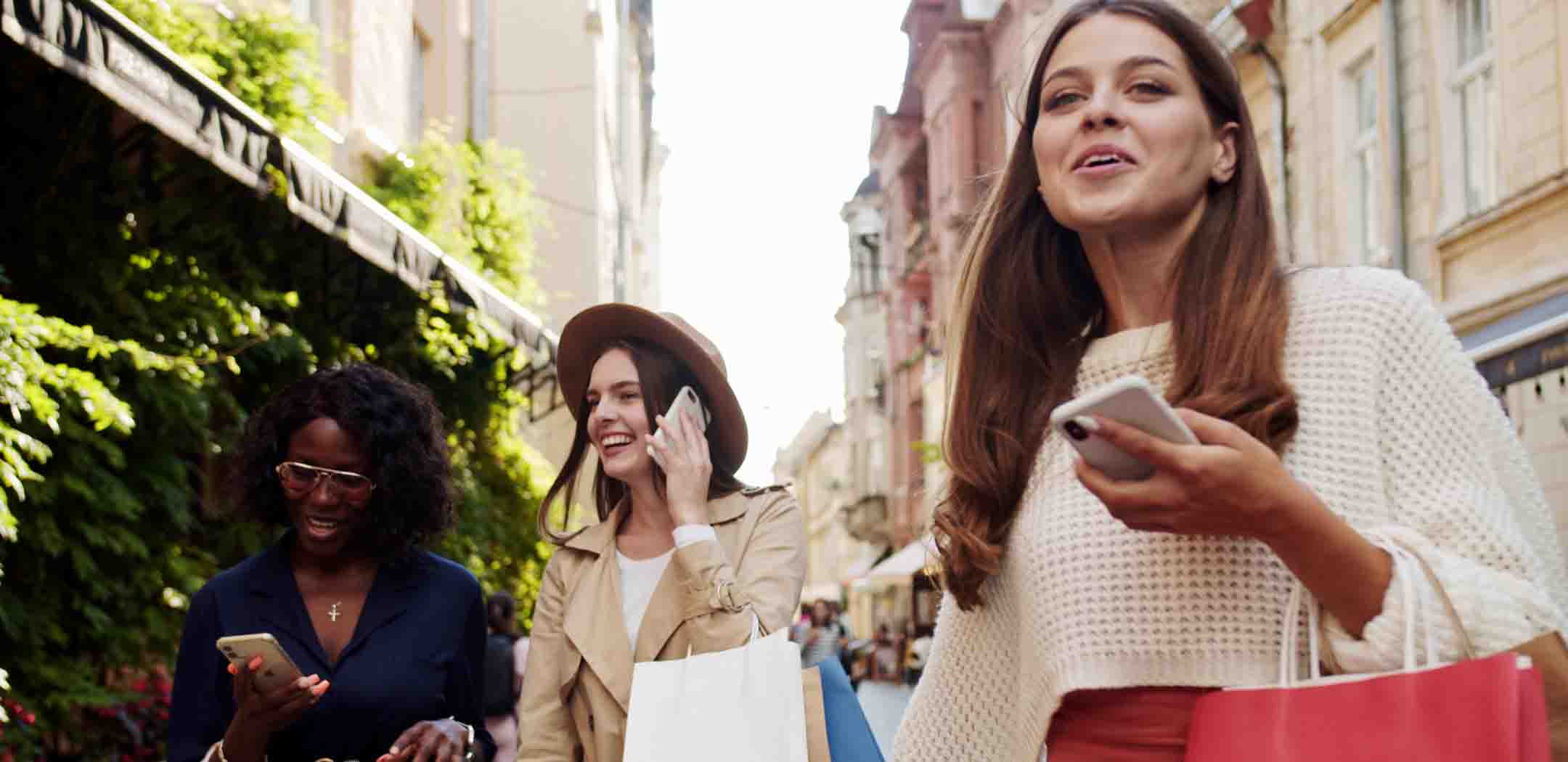 Amplify reach with location-focused geofencing that drives measurable results for businesses in Roseville and Sacramento. Image of three women shopping together.